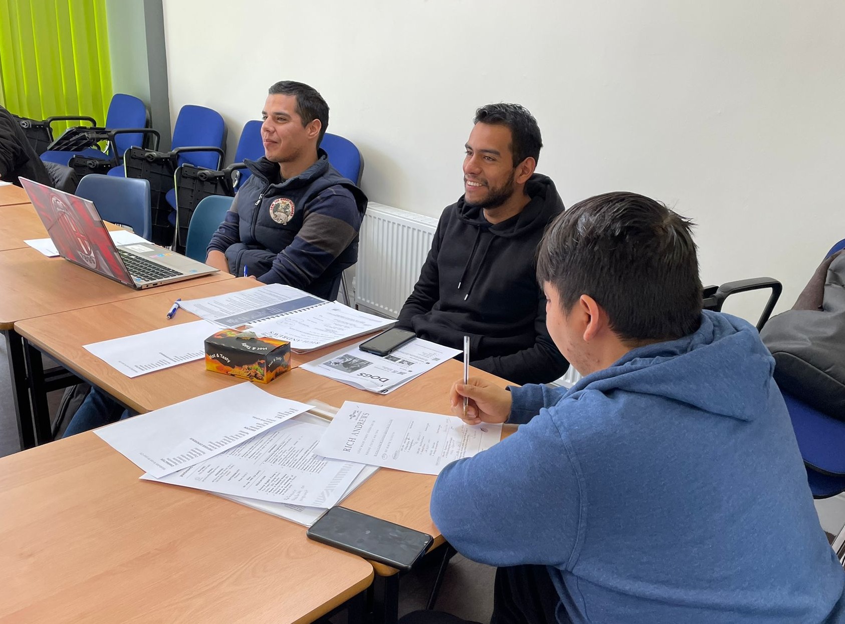 Foreign students learning English in a classroom in Dublin