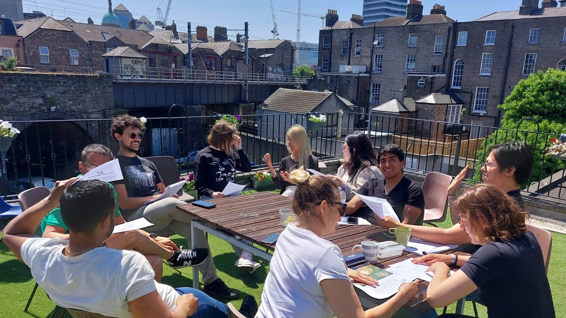 Open-air conversation session held at the school's terrace in summer