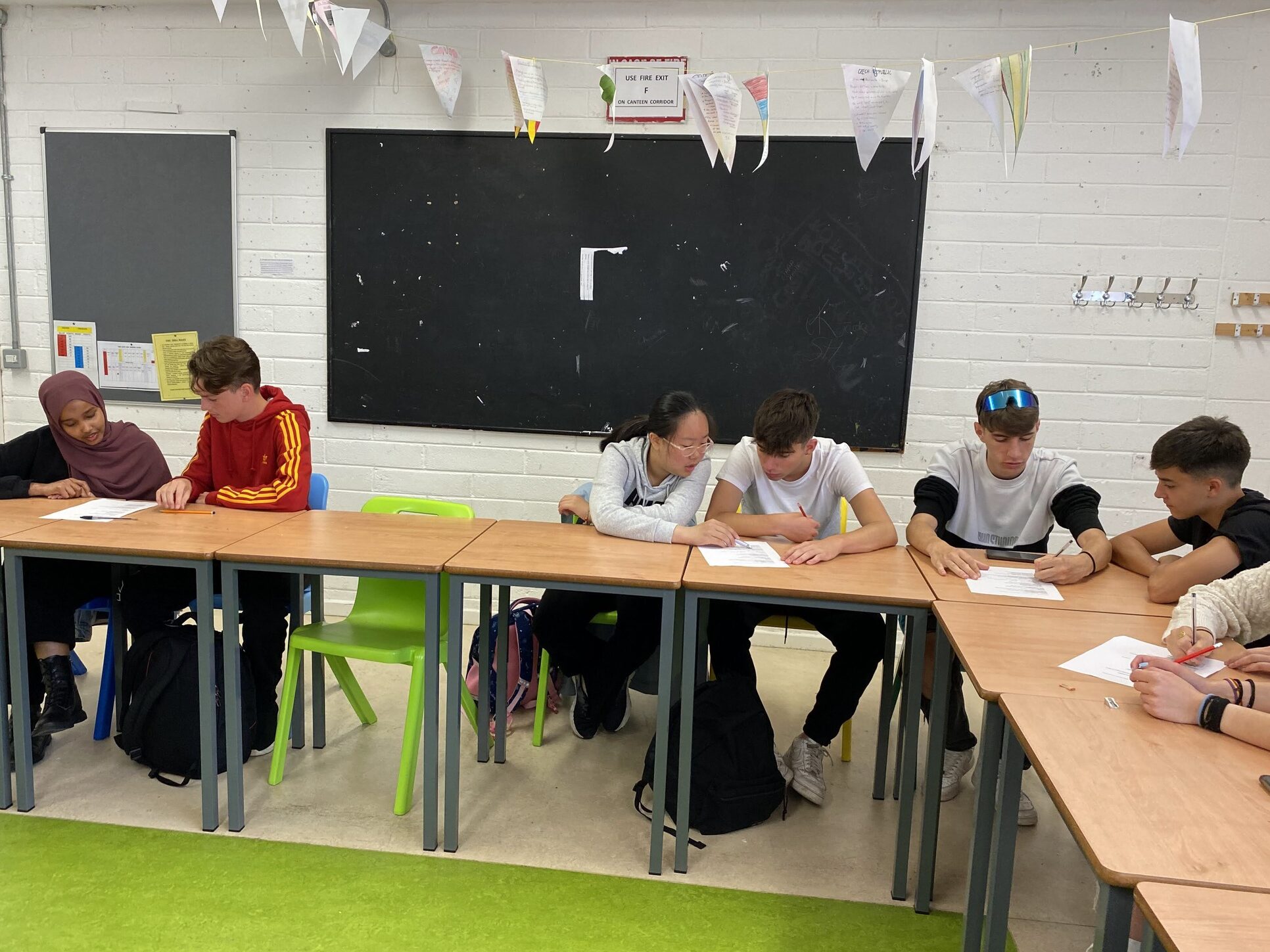 Underage students from various cultures and countries interact through English at the  summer programme for teenagers